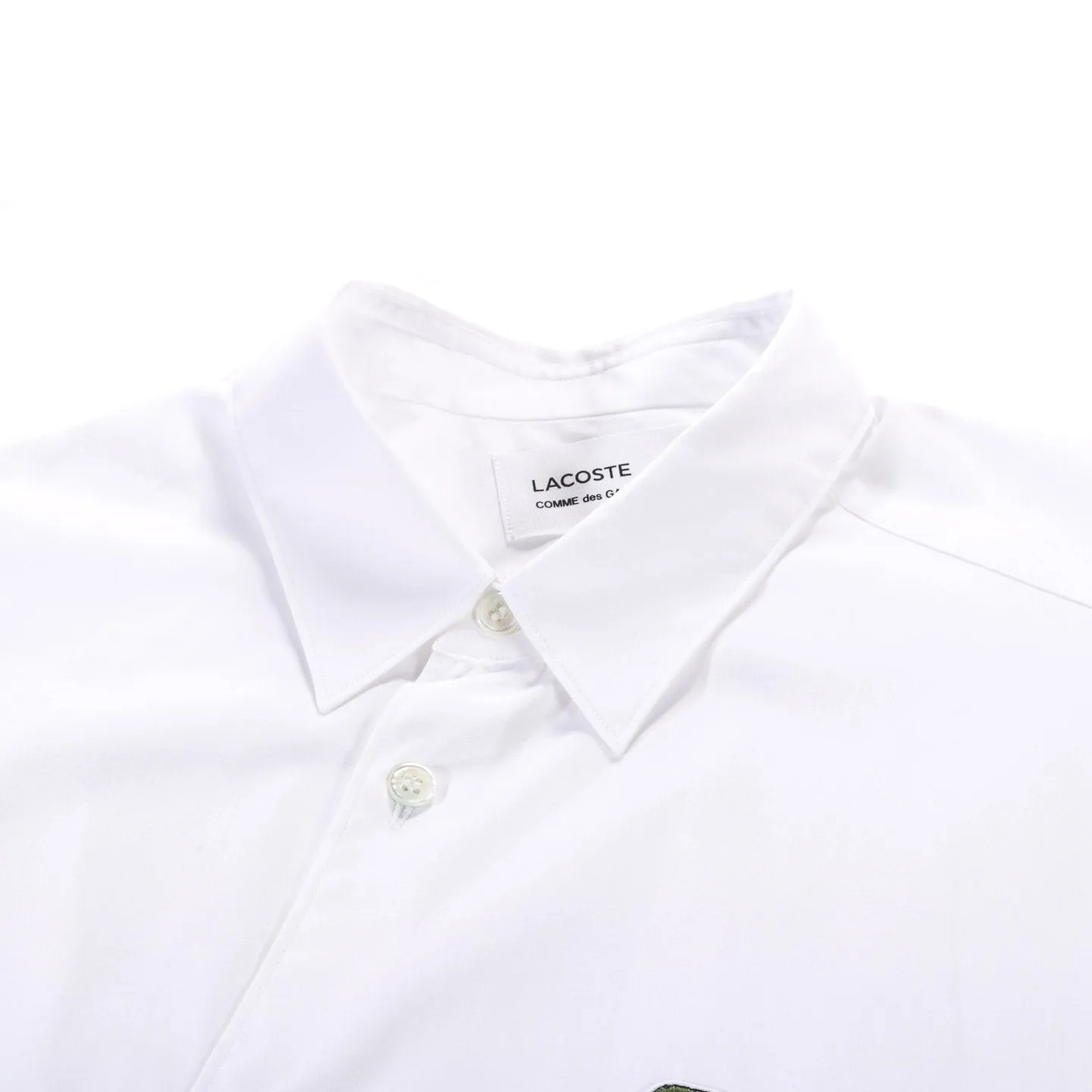 COMME DES GARCONS SHIRT B002 LACOSTE TWISTED SHIRT WHITE